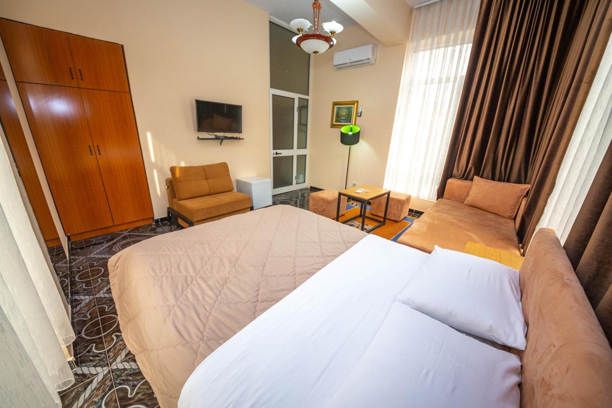Hotel Pik Loti Tirana Quarto foto
